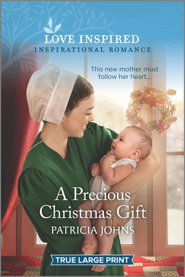 A Precious Christmas Gift [Large Print] 1335429808 Book Cover