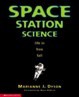 Space Station Science: Life in Free Fall 0590058894 Book Cover