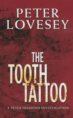 The Tooth Tattoo [Large Print] 1410459446 Book Cover