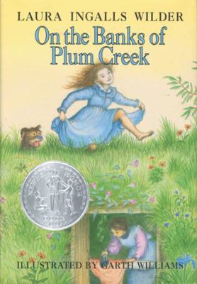 On the Banks of Plum Creek: A Newbery Honor Awa... B0083HMT7Y Book Cover