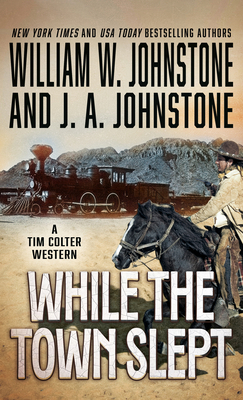 While the Town Slept [Large Print] 1420519832 Book Cover