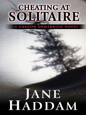 Cheating at Solitaire: A Gregor Demarkian Novel... [Large Print] 1410408795 Book Cover
