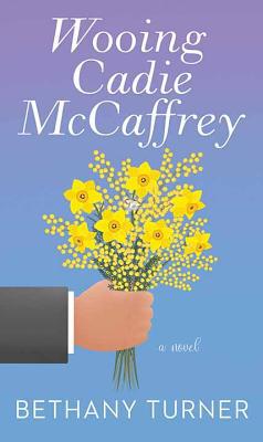 Wooing Cadie McCaffrey [Large Print] 1643582615 Book Cover