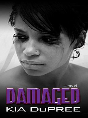 Damaged [Large Print] 1410426882 Book Cover