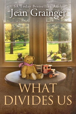 What Divides Us: The Kilteegan Bridge Story - B... 1914958993 Book Cover