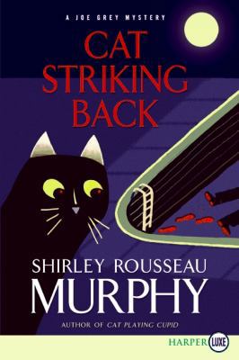 Cat Striking Back: A Joe Grey Mystery [Large Print] 0061885061 Book Cover