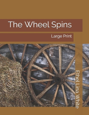 The Wheel Spins: Large Print 1697082734 Book Cover