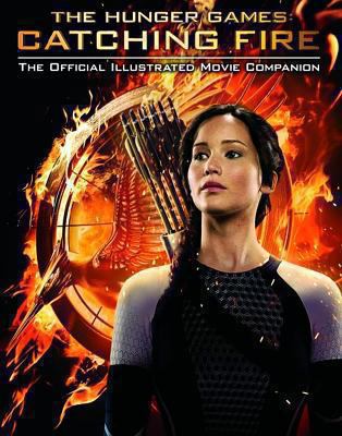 Catching Fire: The Official Illustrated Movie C... 0606324046 Book Cover