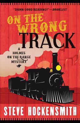 On the Wrong Track: A Holmes on the Range Mystery 1539948625 Book Cover