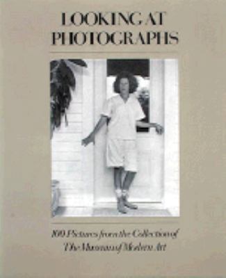 Looking at Photographs: One Hundred Pictures fr... 0810960451 Book Cover