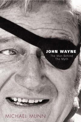 John Wayne : The Man Behind the Myth 1861057229 Book Cover