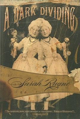 A Dark Dividing 1934609803 Book Cover