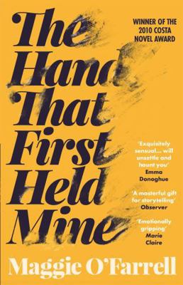 The Hand That First Held Mine 0755308468 Book Cover