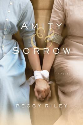 Amity & Sorrow [Large Print] 1410459454 Book Cover