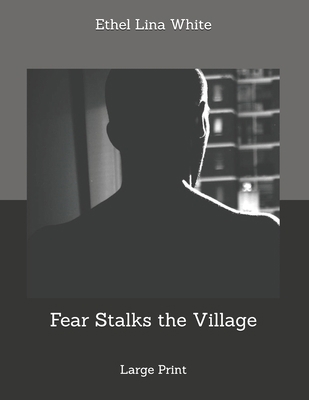 Fear Stalks the Village: Large Print 1707252769 Book Cover