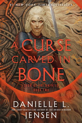 A Curse Carved in Bone: Book Two of the Saga of... 0593599888 Book Cover