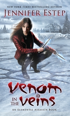 Venom in the Veins: An Elemental Assassin Book 1950076342 Book Cover