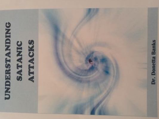 Paperback Understanding Satanic Attacks Book