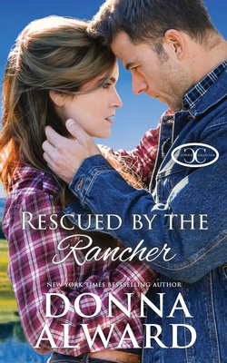 Rescued by the Rancher: A Second Chance Western... 1989132588 Book Cover