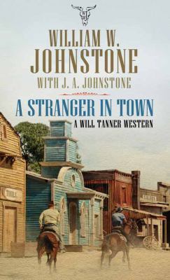 A Stranger in Town (Will Tanner Western) [Large Print] 1683242491 Book Cover