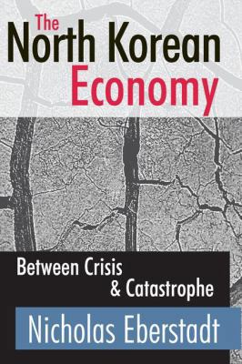 The North Korean Economy: Between Crisis and Ca... 1412810523 Book Cover