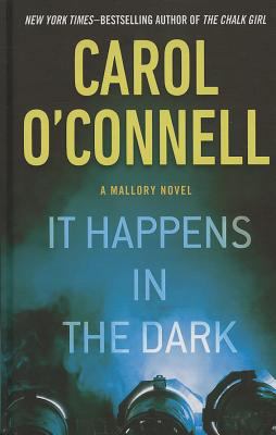 It Happens In The Dark (A Mallory Novel) [Large Print] 1410461440 Book Cover