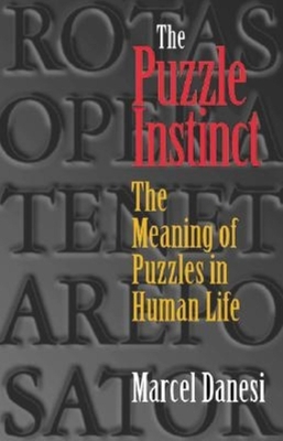 The Puzzle Instinct: The Meaning of Puzzles in ... 0253340942 Book Cover