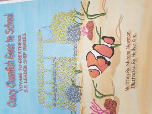 Paperback Clancy Clownfish Goes to School : Voyage to Greatness Book