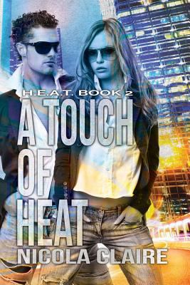 A Touch of Heat (H.E.A.T. Book 2) 1503355985 Book Cover