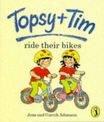 Topsy And Tim Ride Thier Bike 0140559396 Book Cover