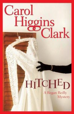 Hitched (Regan Reilly Mysteries, No. 9) 0743289420 Book Cover