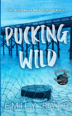 Pucking Wild: A Reverse Age Gap Hockey Romance 1962350983 Book Cover