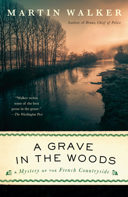 A Grave in the Woods: A Bruno, Chief of Police ... 0593470273 Book Cover