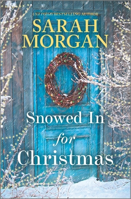 Snowed in for Christmas: A Holiday Romance Novel 1335449965 Book Cover