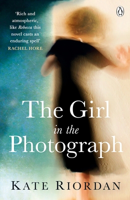 The Girl in the Photograph 1405917423 Book Cover
