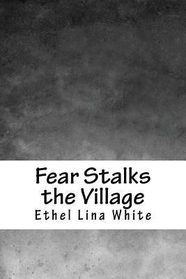 Fear Stalks the Village 1987449150 Book Cover