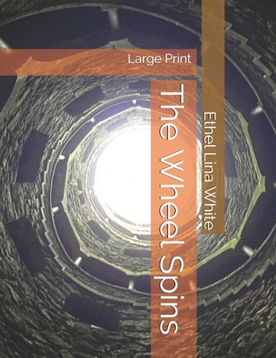 The Wheel Spins: Large Print 1695774272 Book Cover