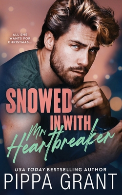 Snowed in with Mr. Heartbreaker 1955930309 Book Cover