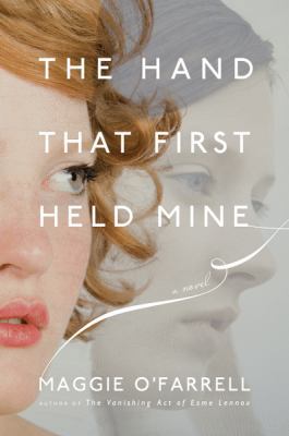 The Hand That First Held Mine 0547330790 Book Cover
