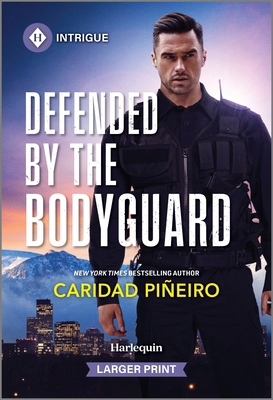 Defended by the Bodyguard [Large Print] 1335081984 Book Cover