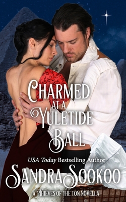 Charmed at a Yuletide Ball: a Thieves of the To... 1700722204 Book Cover