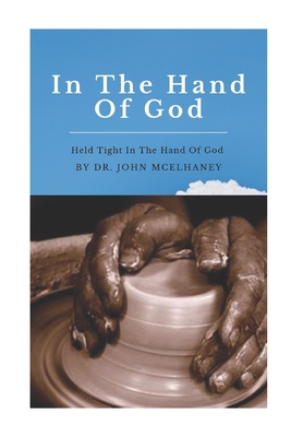 In The Hand Of God: Held Tight in the Loving Ha... 1078044031 Book Cover