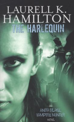 The Harlequin. Laurell K. Hamilton 184149321X Book Cover