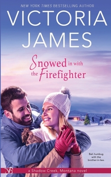Paperback Snowed in with the Firefighter Book