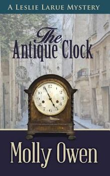 Paperback The Antique Clock: A Leslie LaRue Mystery Book