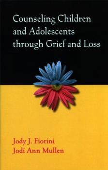 Paperback Counseling Children and Adolescents Through Grief and Loss Book