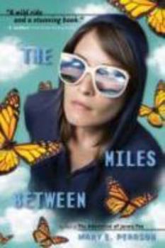 Paperback The Miles Between Book