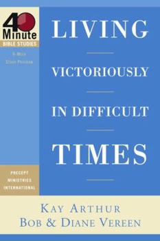 Paperback Living Victoriously in Difficult Times Book