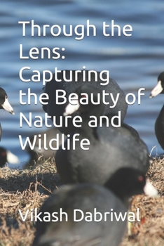 Paperback Through the Lens: Capturing the Beauty of Nature and Wildlife Book