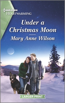 Mass Market Paperback Under a Christmas Moon: A Clean Romance [Large Print] Book